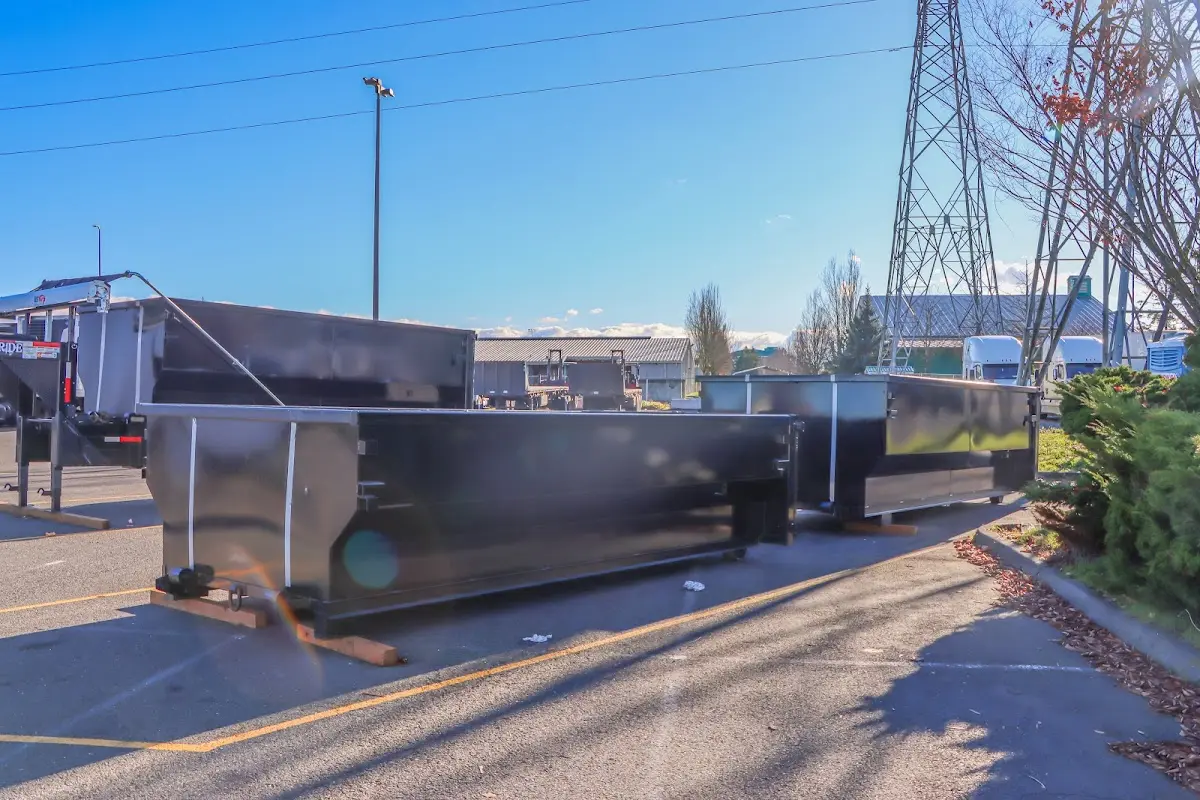 Roll-off dumpster ready for waste disposal at job site for Construction Dumpster Rental in Independence